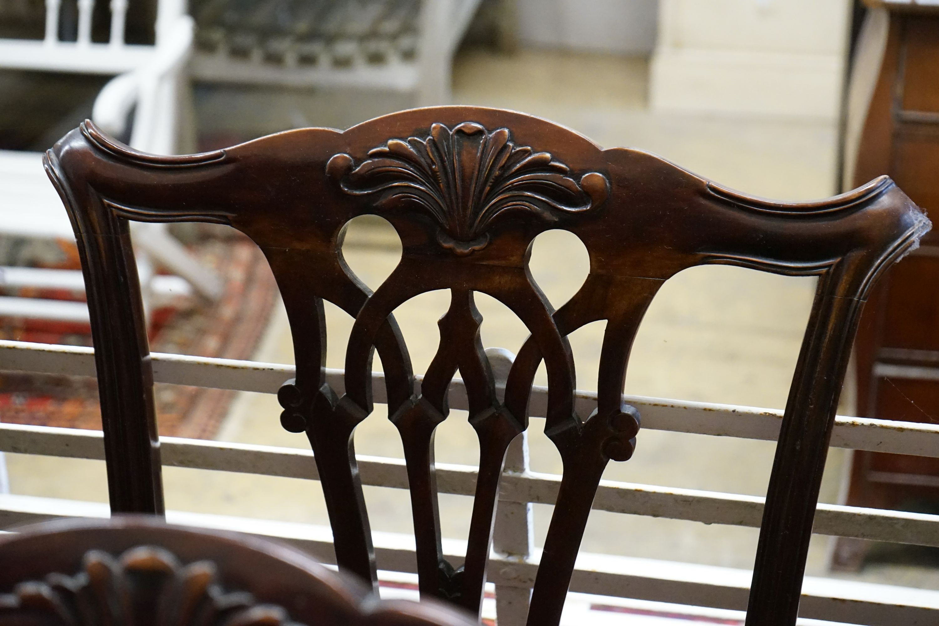 A set of six early 20th century Chippendale revival mahogany dining chairs